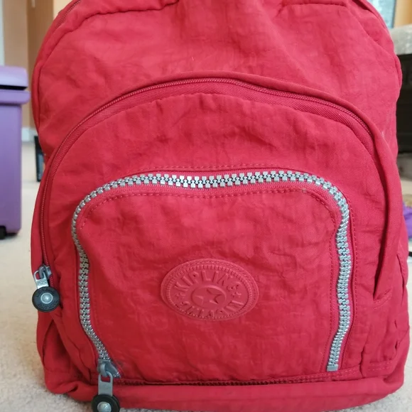 Kipling size Adjustable backpack. No laptop pouch. Minor wear and tear. b38bc6b2-b909-4abe-b5e2-  main image 3